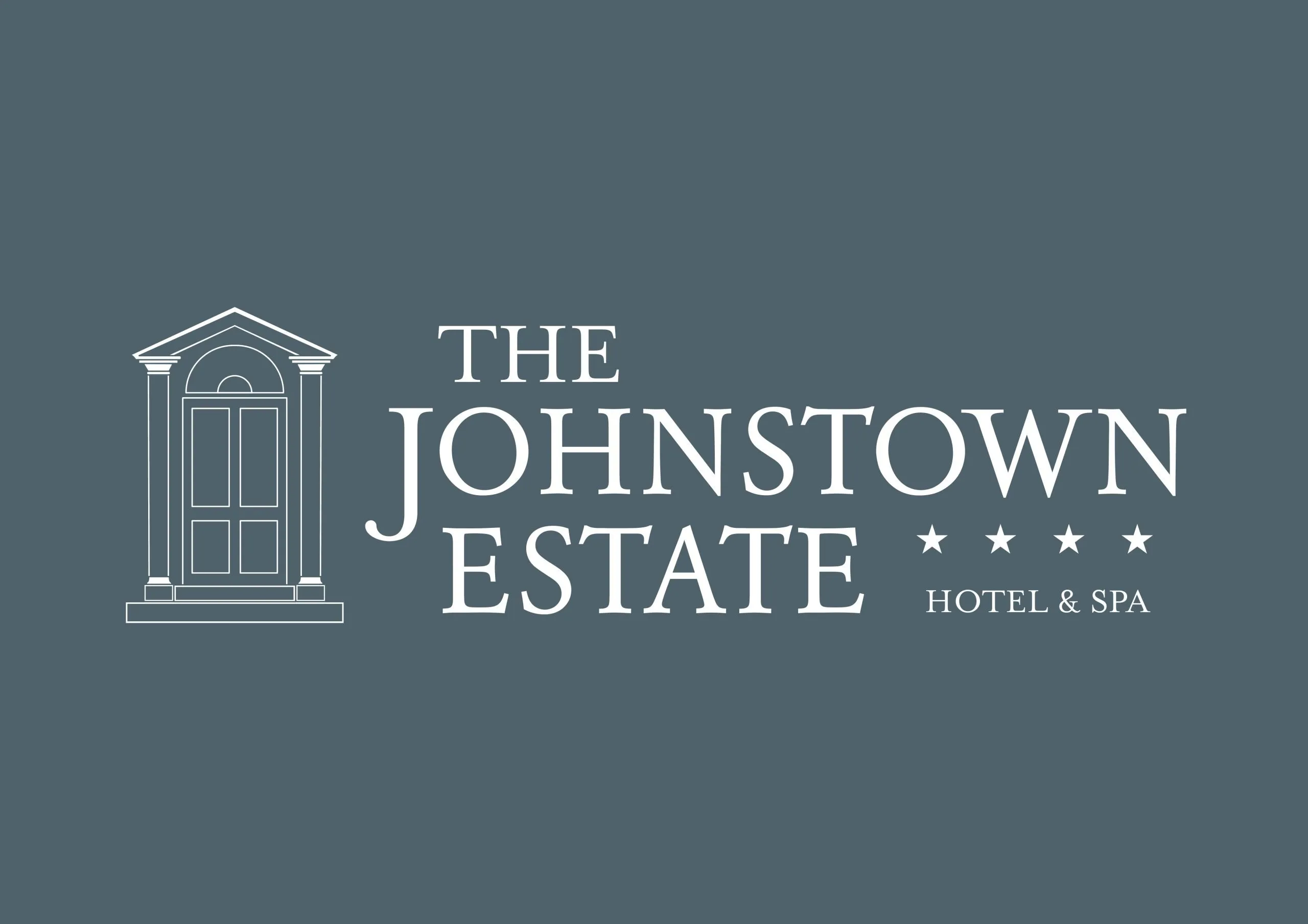 The Johnstown Estate logo – minimalist column icon above the words “THE JOHNSTOWN ESTATE” on a dark background, symbolizing luxury and heritage